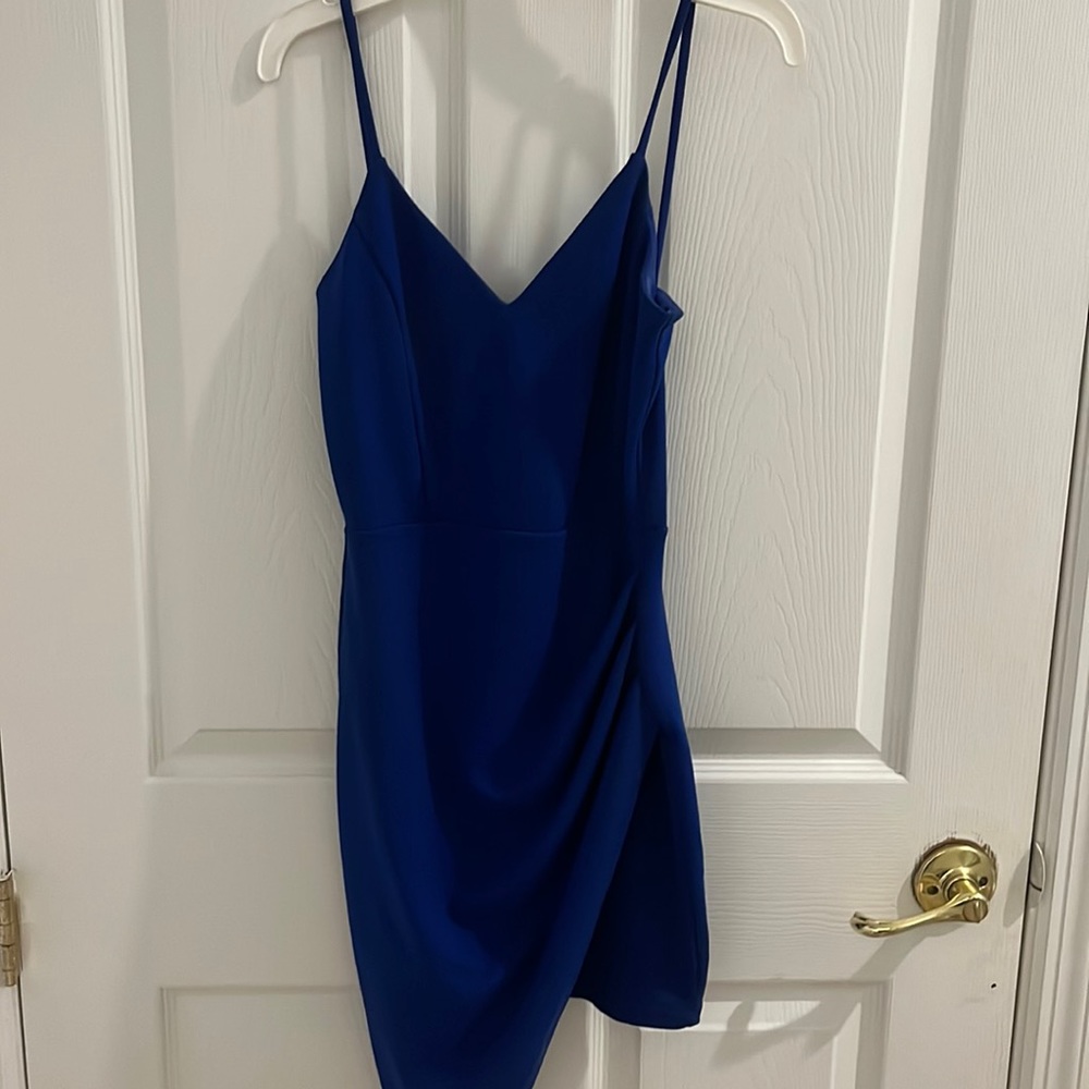 Royal blue  tight dress, beautiful rhinestones connecting the back of the dress.